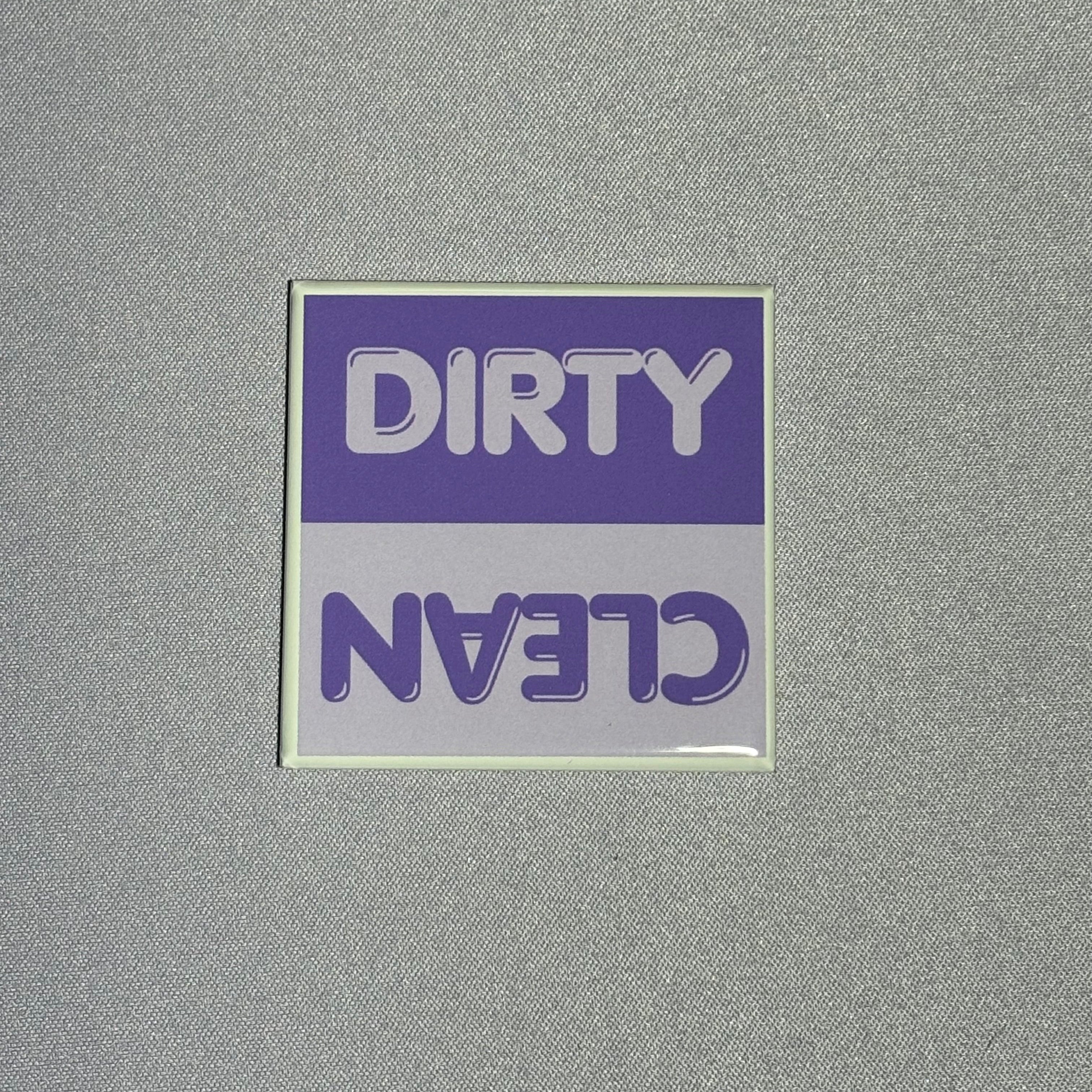 2inx2in dark purple dishwasher magnet by millie with "dirty" and "clean" to indicate cleanliness of dishes inside dishwasher