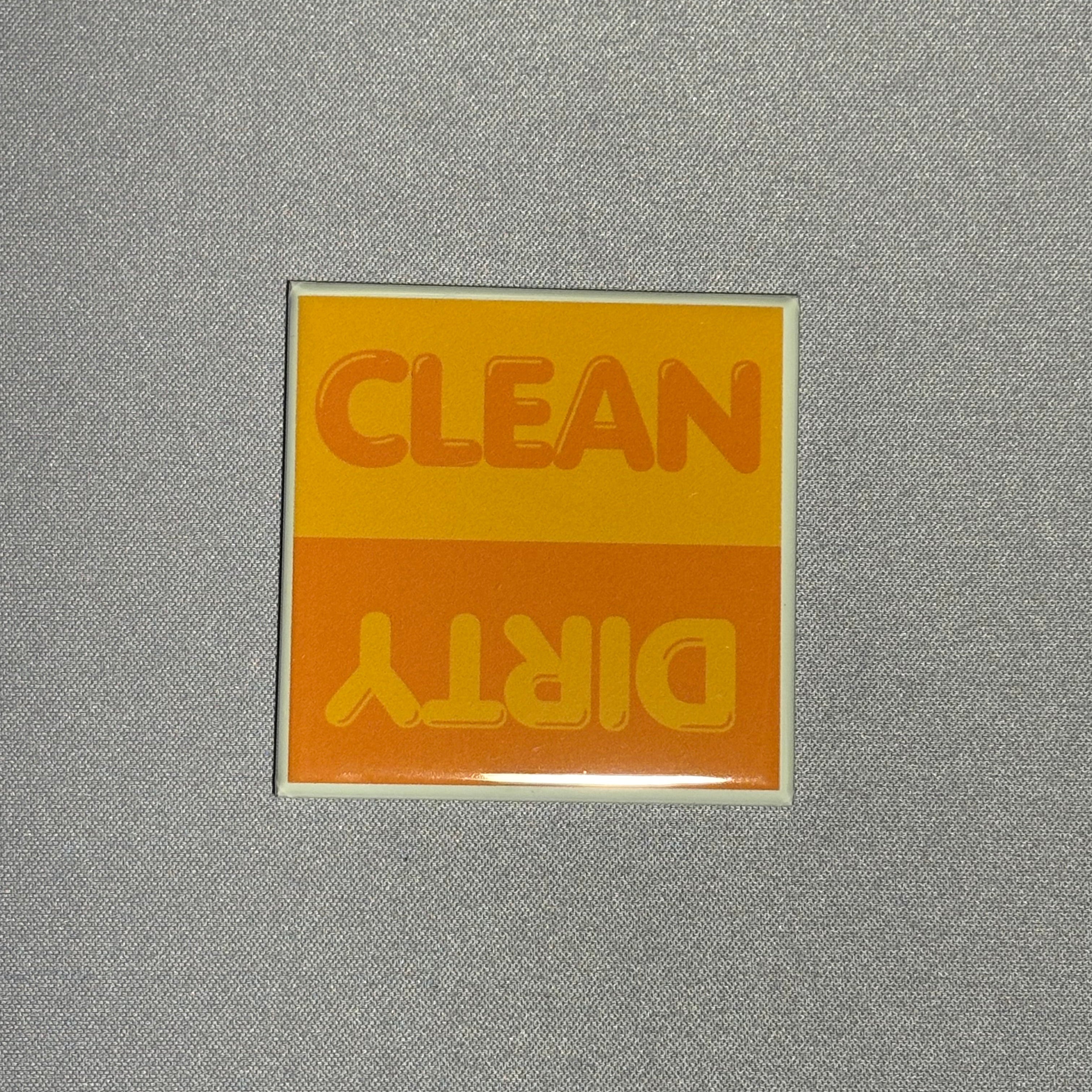 2inx2in orange dishwasher magnet by millie with "clean" and "dirty" to indicate cleanliness of dishes inside dishwasher