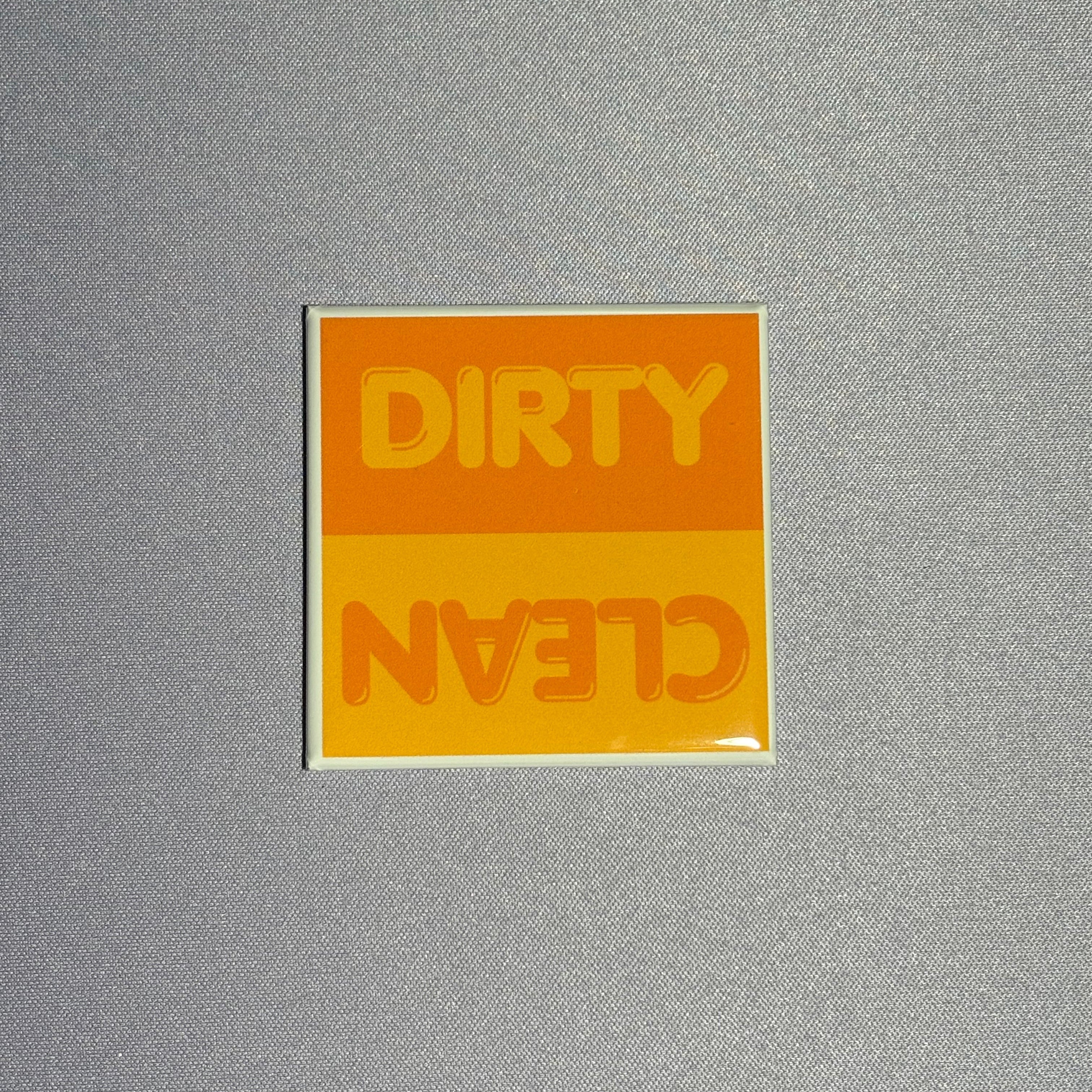 2inx2in orange dishwasher magnet by millie with "dirty" and "clean" to indicate cleanliness of dishes inside dishwasher
