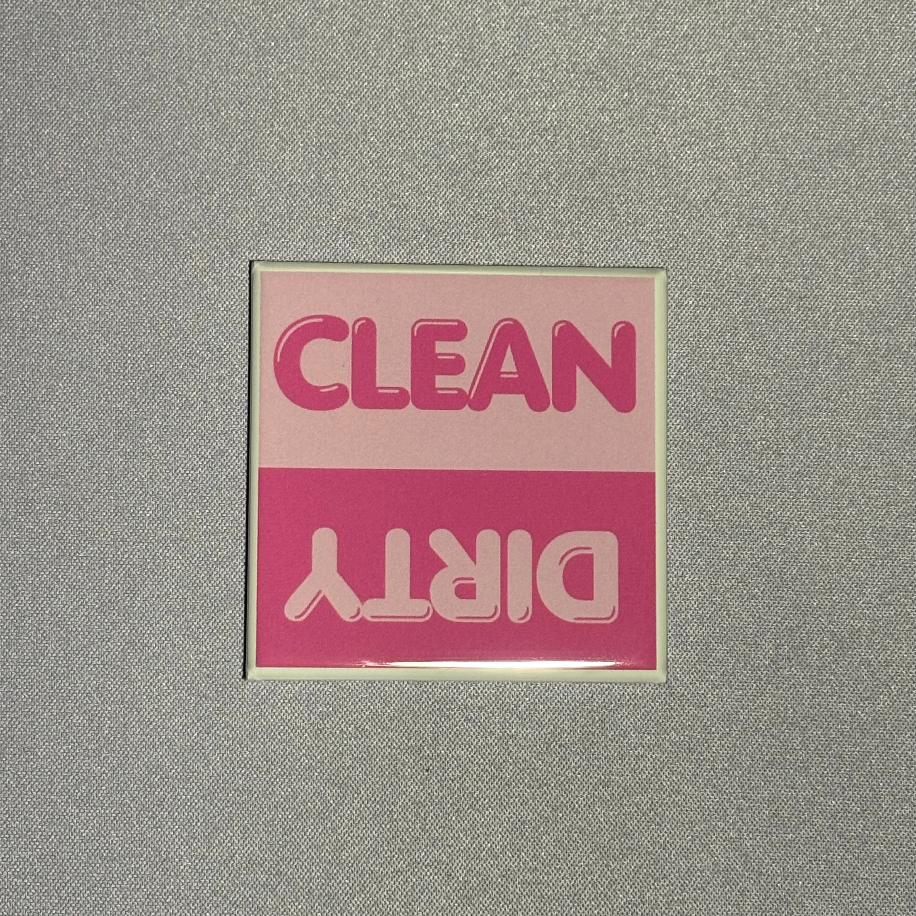 2inx2in pink dishwasher magnet by millie with "clean" and "dirty" to indicate cleanliness of dishes inside dishwasher